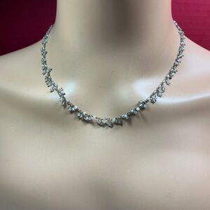 14k gold filled necklace with clear beads. 16.5 to 18.5 inches long